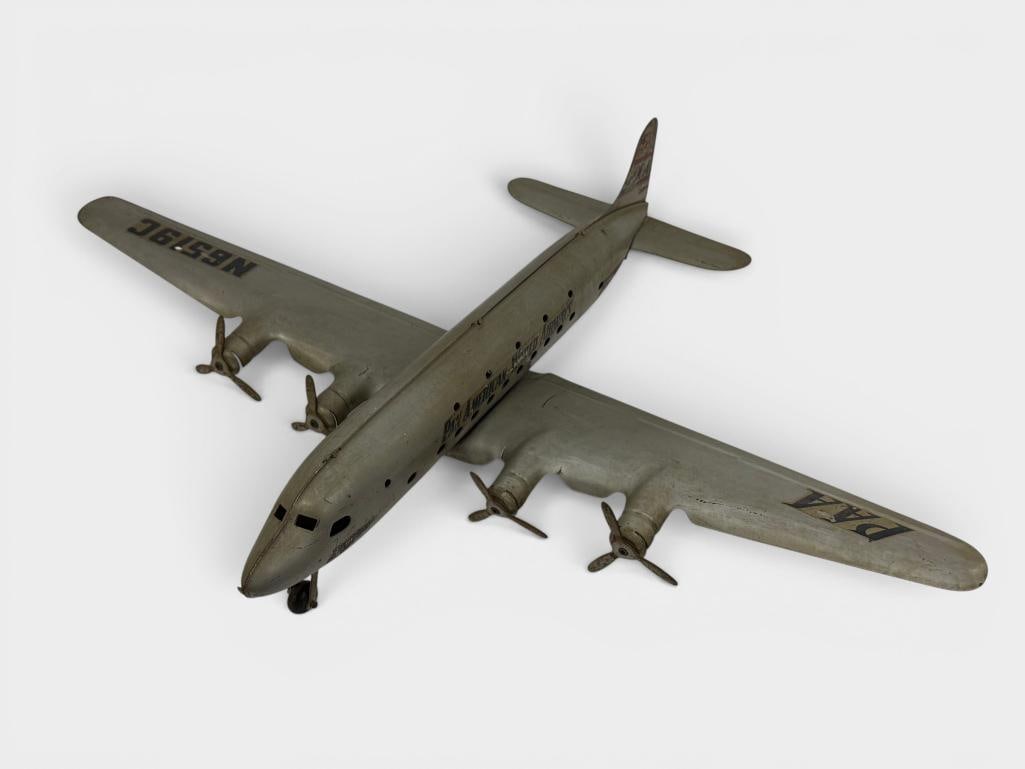 Marx Pressed Steel Pan American World Airways Plane: Marx Pressed Steel Pan American World Airways Plane. Approx. 27 x 22 x 6 inches.