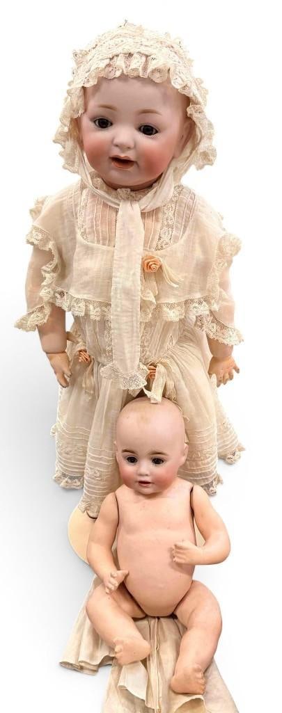 2 Antique German Porcelain Dolls: 2 Antique German Porcelain Dolls. One marked J.D.K. approx. 18 inches.
