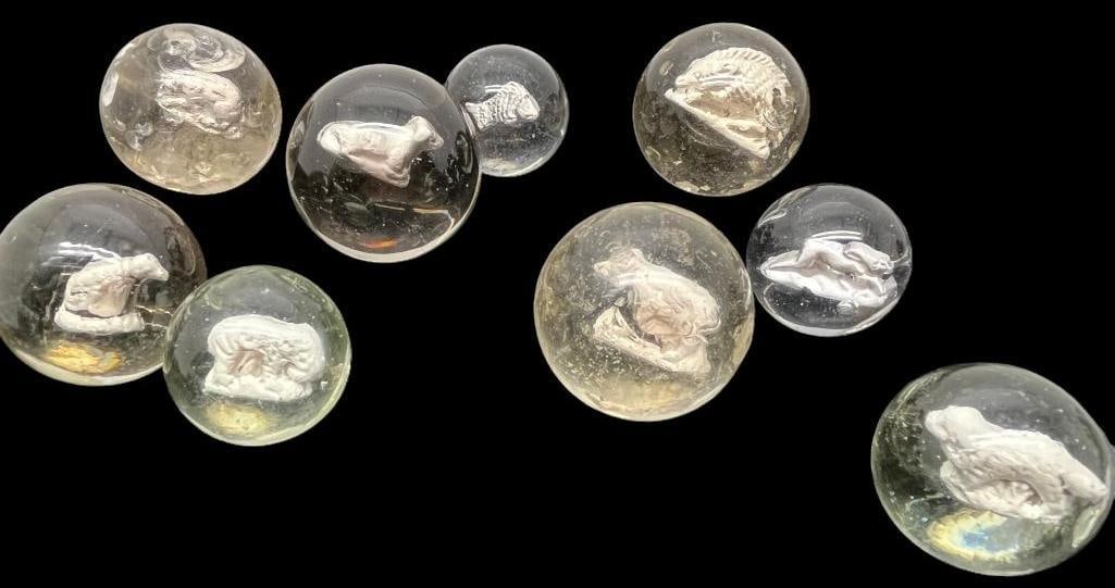 9 Vintage Sulfide Marbles: 9 Vintage Sulfide Animal Marbles. Including Fish, Bear, Elephant, dog and more.