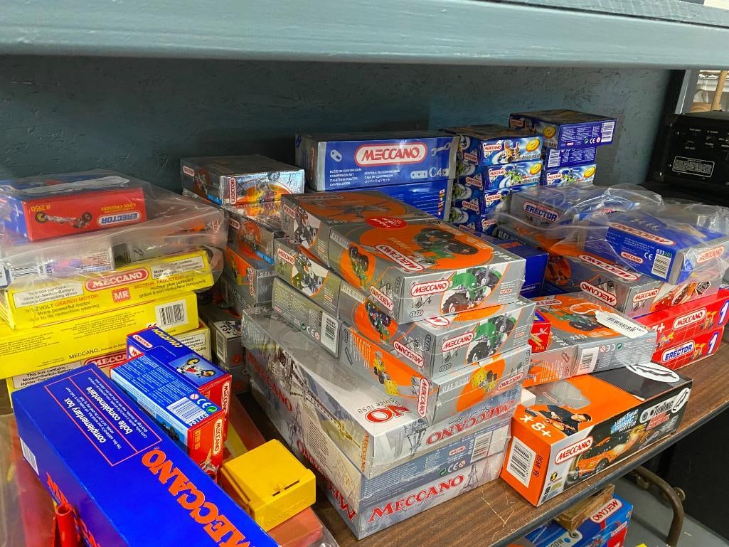 Group of Meccano Toys: Group of Meccano Toys. Most are new in box. Including metal robots, Eiffel Tower and more. Approx. 58 pieces.