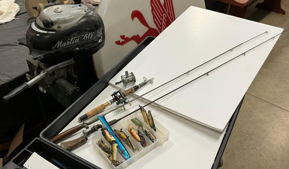 Martin 60 Outboard Motor and more: Martin 60 Outboard Motor, fishing poles and lures.