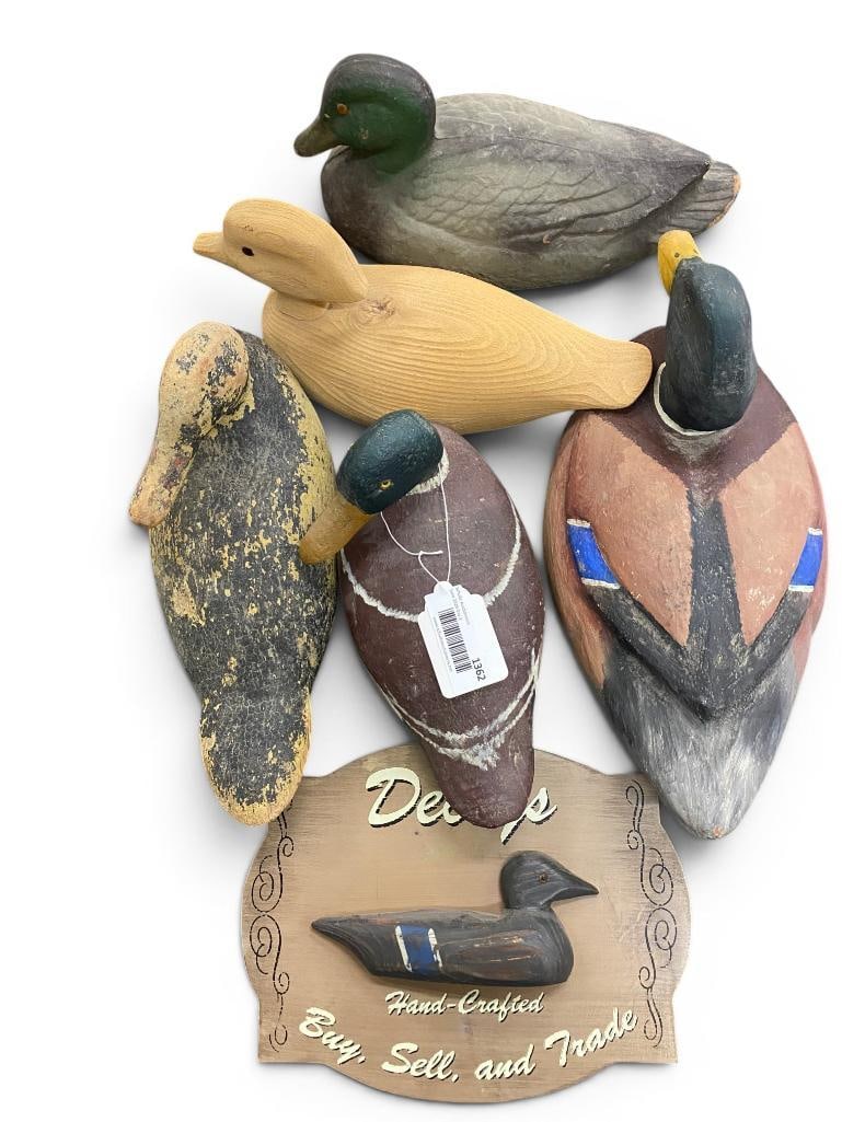5 Wood Duck Decoys and Sign: 5 Wood Duck Decoys and Sign. 6 pieces total. Duck approx. 17 x 8 x 6 inches.