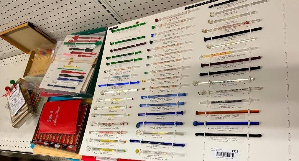 Collection of Drink Stirrers: Collection of Drink Stirrers, mostly glass. 4 boards.