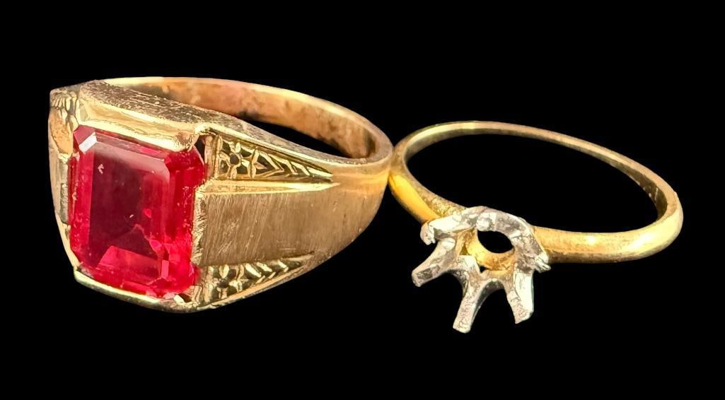 18k Gold Tiffany Ring and 14k Gold Ring: 2 rings. 18k Gold Tiffany Ring, no stone. Approx. 1.8 grams. Approx. size 5.5. 14k Gold ring with red stone, approx. 4.3 grams, approx. size 7.5.