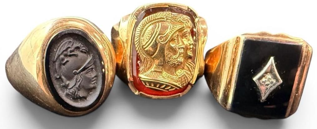 3 10k Gold Mens Rings: 3 10k Gold Mens Rings. Approx. 28.9 grams. Approx. size Square Onyx 11, Black Cameo 11.5 and 9.5.