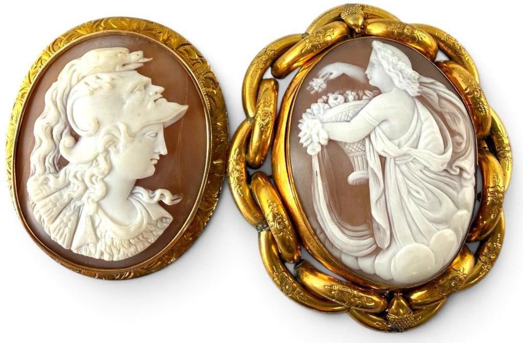 2 Cameo Pins: 2 Cameo Pins. Unique face Helmet cameo is set in 14k Gold, approx. 2.5 x 2 inches. Pinchbeck cameo is approx. 3 x 2.5 inches, not gold.
