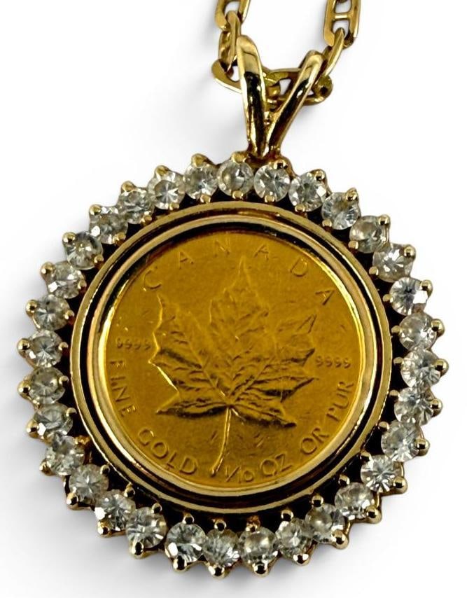 1986 Canada $5 Gold Coin with 14k Gold Chain: 1986 Canada $5 Gold Coin in 14k bezel with 14k Gold Chain. Total weight approx. 12.1 grams. Chain from clasp to bezel approx. 7.5 inches.