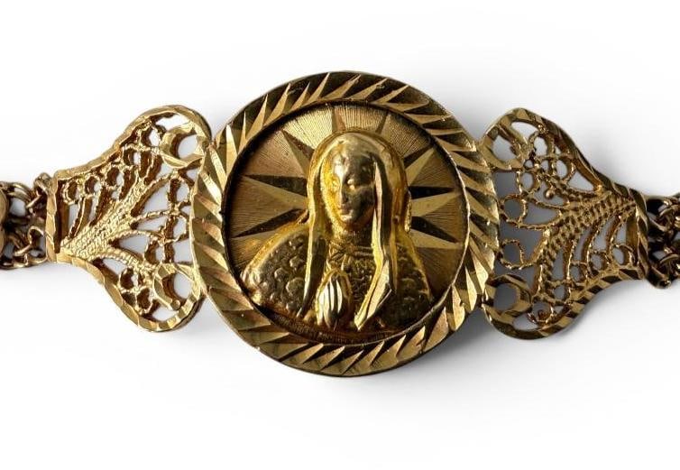 14k Gold Virgin Mary Filigree Bracelet: 14k Gold Virgin Mary Filigree Bracelet. Approx. 10.6 grams. Approx. 6.75 inches long.