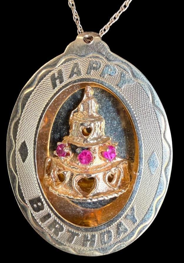 14k Gold Chain with Happy Birthday Pendant: 14k Gold Chain with 14k Happy Birthday Pendant, cake with stones. Approx. 8.6 grams. Clasp to pendant approx. 15 inches.