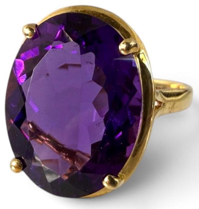 14k Gold with Amethyst Ring: 14k Gold with Amethyst Ring. Approx. 3.2 grams. Approx. size 6.5.
