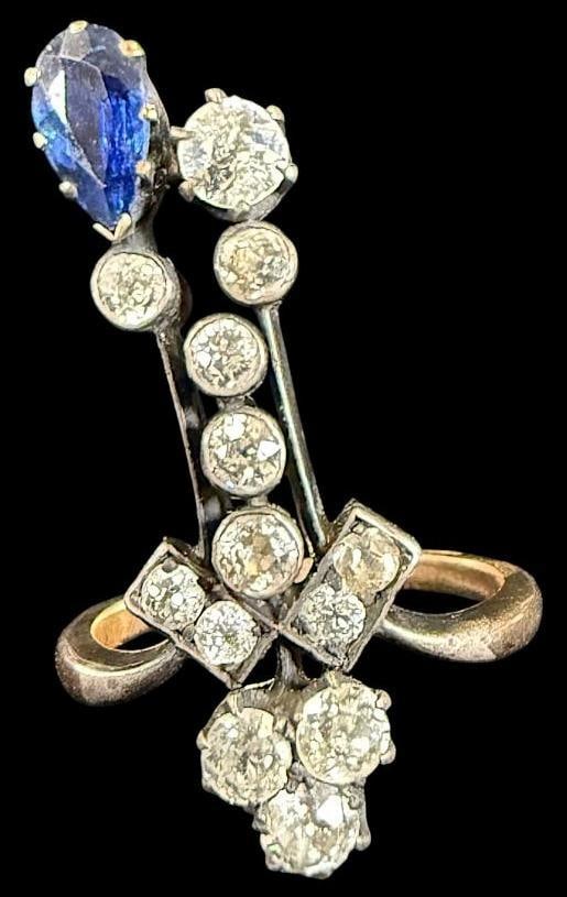 14k Gold with Diamonds and Sapphire ring: 14k Gold with Diamonds and Sapphire Tiara style ring. Approx. 4.5 grams. Approx. size 7.