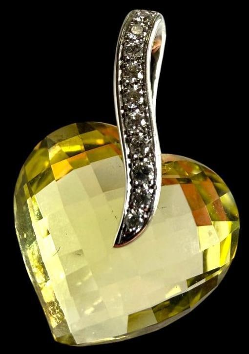 Lemon Quartz Pendant set in 18k Gold with Diamonds: Lemon Quartz Pendant set in 18k Gold with Diamonds. Marked RKG ( Richard Krementz Gemstones ) 1866. Approx. 1 inch.