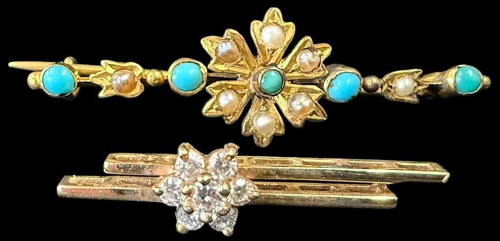 14k and 10k Gold pins: 14k and 10k Gold pins. Total 4.7 grams. 10k with blue stones approx. 2.6 grams. 14k pin approx. 2.1 grams.
