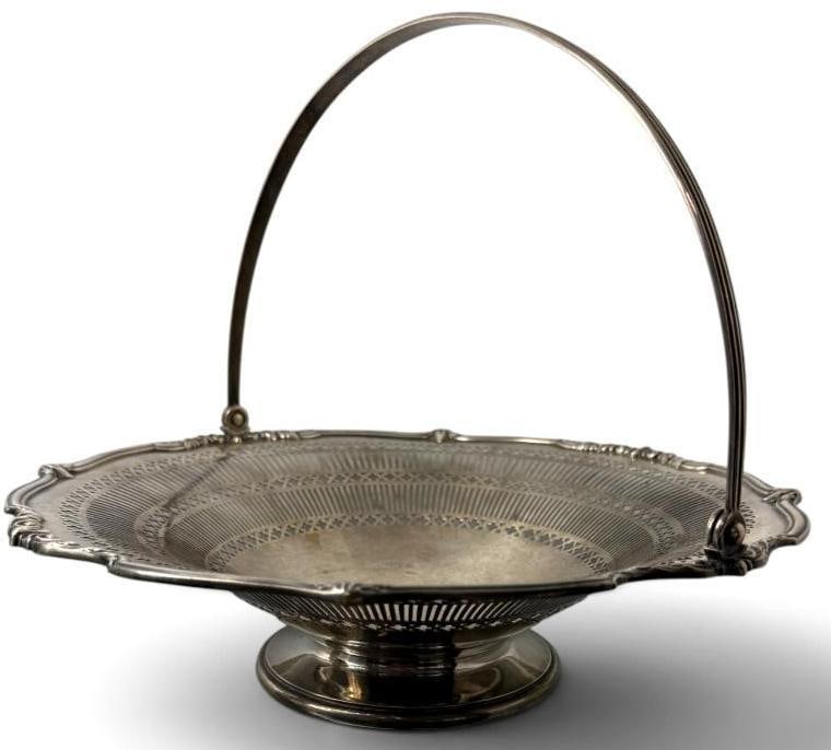 Sterling Silver Reticulated Swing Basket: Sterling Silver Reticulated Swing Basket. Approx. 25.8 ozt. Made for Tiffany & Co. Approx. 12.5 inches.