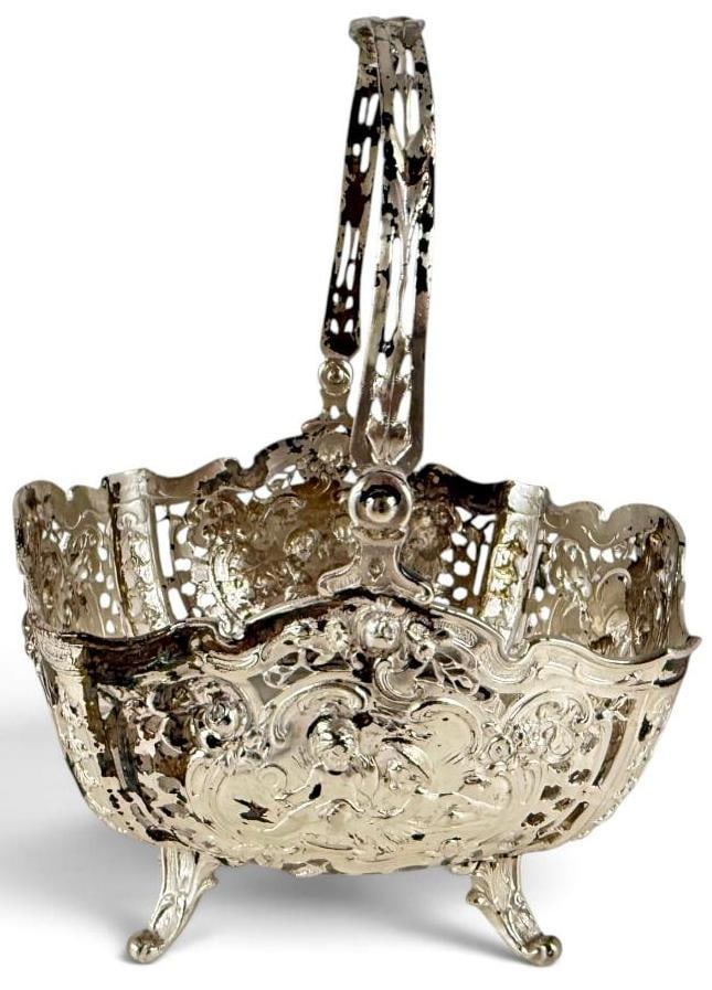 Sterling Silver Basket: Sterling Silver Basket. Approx. 8.3 ozt. Marked 930. Approx. 7.5 x 5.5 x 5 inches.