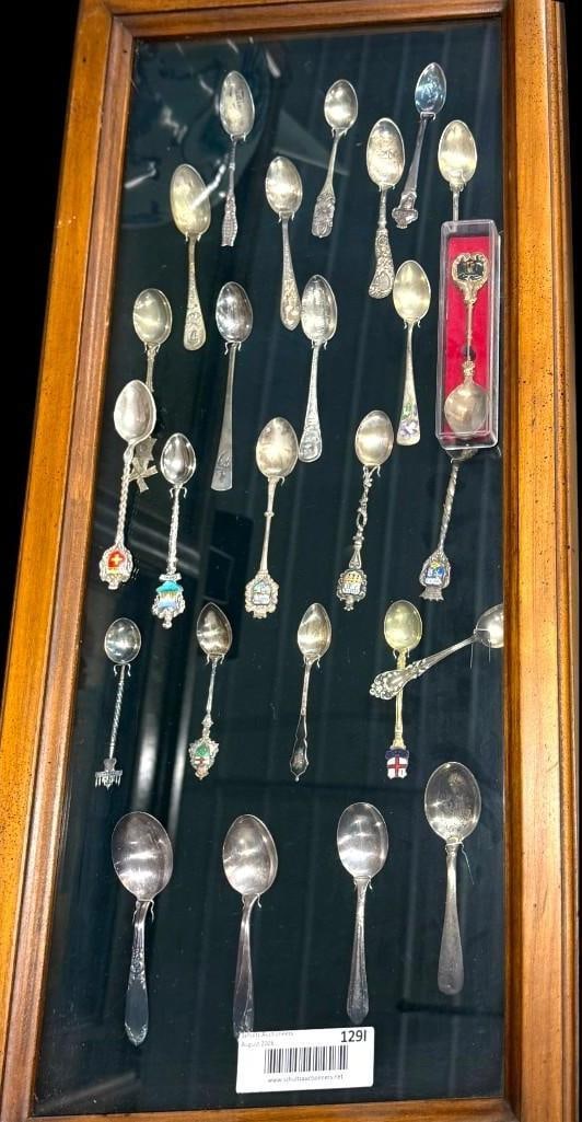 Collection of Souvenir Spoons and more: Collection of Souvenir Spoons and more. Approx. 27 spoons. Some sterling. In display case. Case approx. 26 x 12 inches.