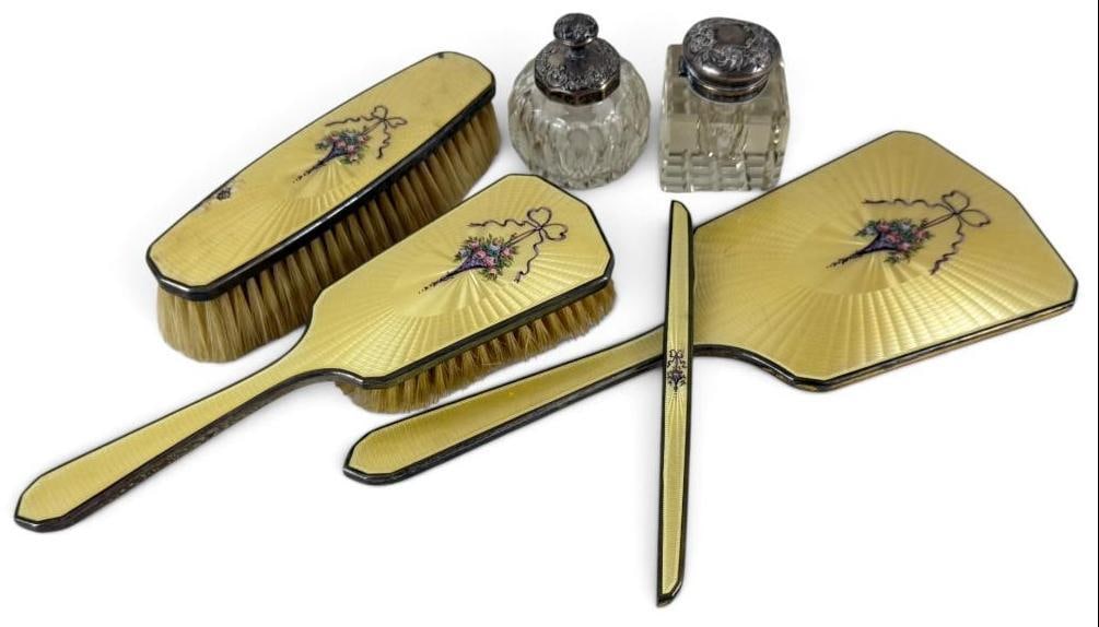 Sterling Silver and Enamel Dresser set and more: Sterling Silver and Yellow Guilloche Enamel Dresser set, sterling top inkwell and dresser jat. 6 pieces. Mirror approx. 11.75 x 4.5 inches.