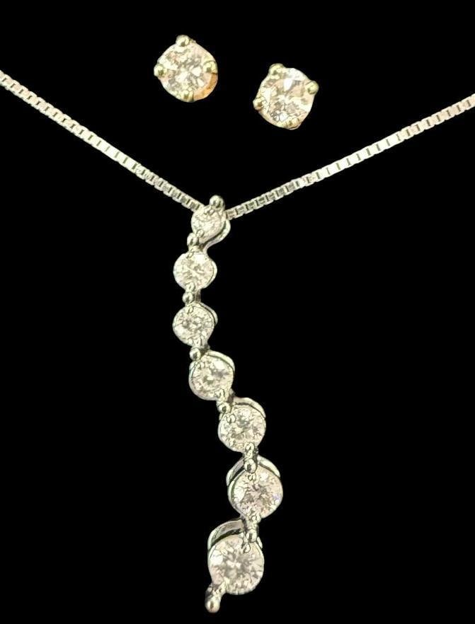 14k Gold Necklace and Earrings with Diamonds: 14k Gold Necklace and Earrings with Diamonds. Approx. 2.2 grams.