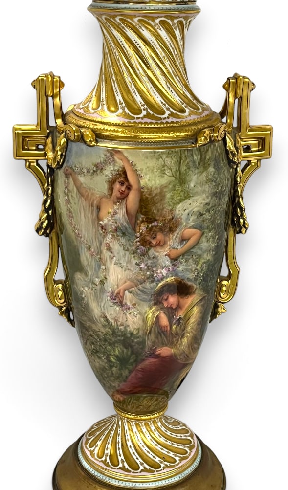 Fabulous hand painted porcelain lamp: Fabulous hand painted porcelain lamp with ornate ormolu mounted handles and gold gilt. Possibly signed F. Tenner. Approx. 38 x 11 x 8 inches.