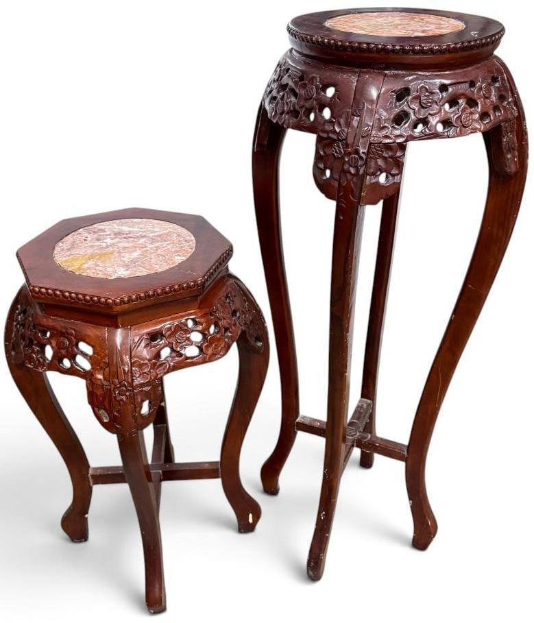 2 Chinese Carved Rosewood stands with marble inlaid tops: 2 Chinese Carved Rosewood stands with marble inlaid tops. Approx. 35 x 13 x 13 and 25 x 15 x 15 inches.