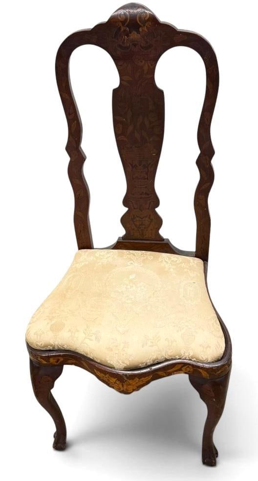 Queen Anne chair with intricate inlay: Queen Anne chair with intricate inlay. Featuring flower and urn inlays. Claw and ball feet. 19th century. Approx. 45 x 21 x 18 inches.