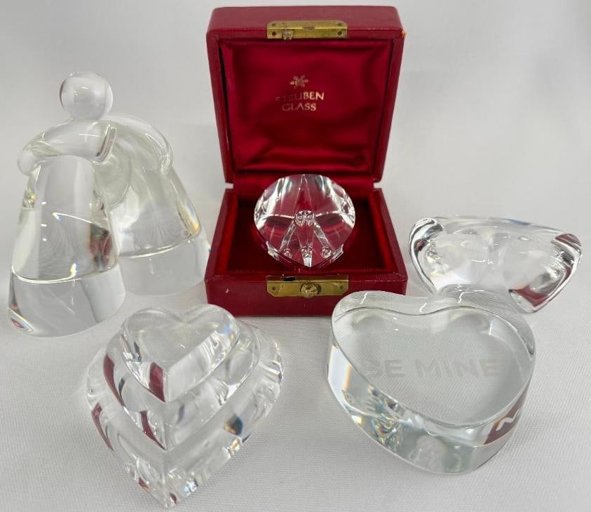 Steuben Art Glass Hearts and Embrace Paperweights: Steuben Art Glass Hearts and Embrace Paperweights. 5 pieces. Embrace approx. 4.5 x 4.5 x 2.5 inches.