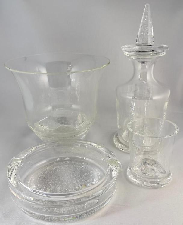 4 Pieces Steuben Art Glass Controlled Bubble: 4 Pieces Steuben Art Glass Controlled Bubble. Including Decanter, Cigar Ashtray, Cup and Vase. Vase approx. 8 x 8.5 x 8.5 inches.