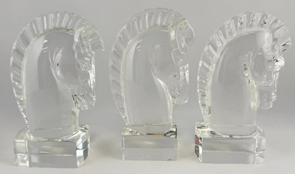 3 Steuben Crystal Equestrian Horse Heads: 3 Steuben Crystal Equestrian Horse Heads, paperweights. Approx. 5 inches tall.