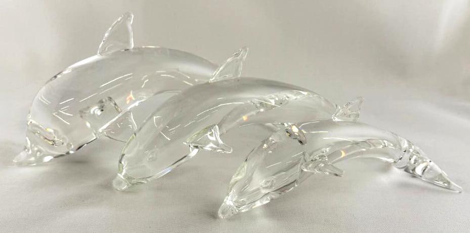 3 Steuben Art Glass Dolphins: 3 Steuben Art Glass Dolphins. Largest approx. 10 x 5 x 3 inches.