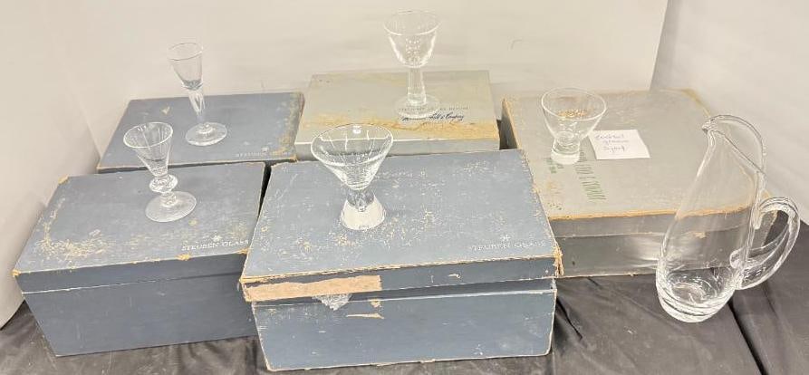 Steuben Glasses and Pitcher: Steuben Glasses and Pitcher. Approx. 30 pieces. Pitcher approx. 10 inches tall.