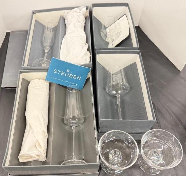 8 Steuben Glasses: 8 Steuben Glasses. Flutes approx. 10 inches tall.