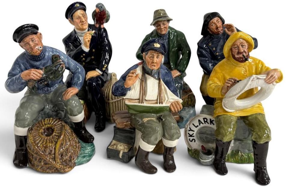 6 Royal Doulton Figures: 6 Royal Doulton Figures. Including Sea Harvest, The Lobster Man, The Boatman, Shore Leave, A Good Catch and Tall Story. Tallest approx. 8 inches.