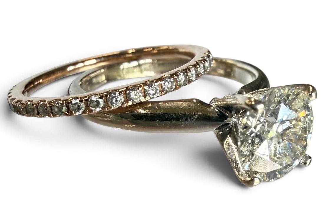 1.02 ct Diamond set in 14k Gold and 14k and Diamond band: 1.02 ct Diamond set in 14k Gold and 14k and Diamond band. Approx. 3.2 grams. Includes copy of GSI report. Rings approx. size 4.