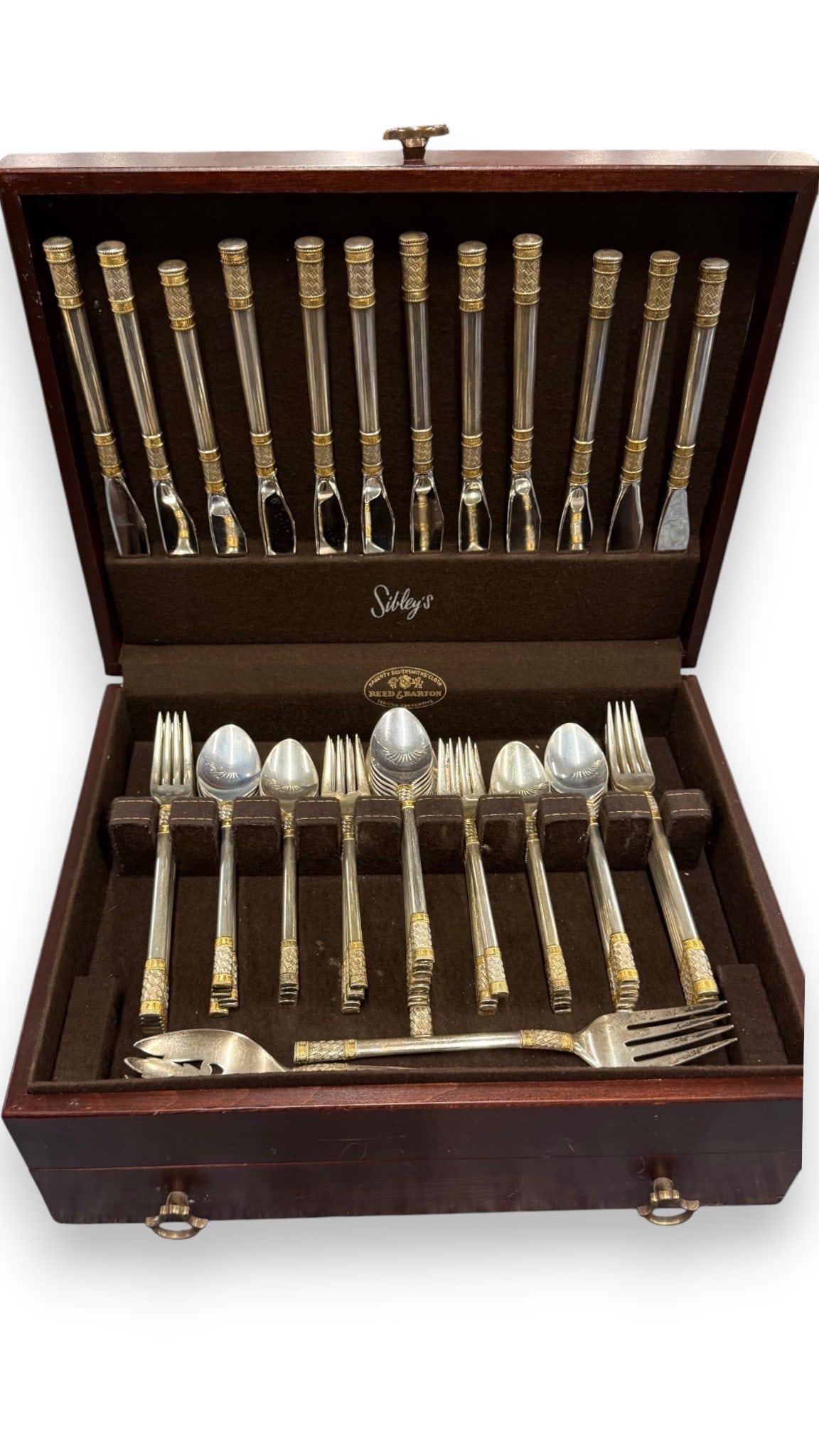 Rare Wallace Golden Aegean Weave sterling silver flatware: Rare Wallace Golden Aegean Weave sterling silver flatware, accented with 24k gold bands. Approx. 98 ozt. Approx, 72 pieces. Service for 12. Knives are counted at 1/2 oz each.