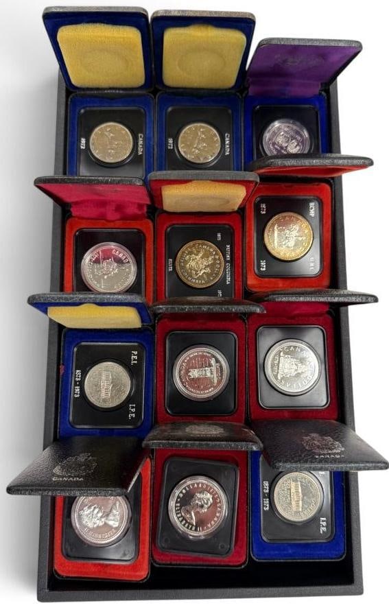 Canada Silver Dollars and Halves: Canada Silver Dollars and Halves. 12 pieces.