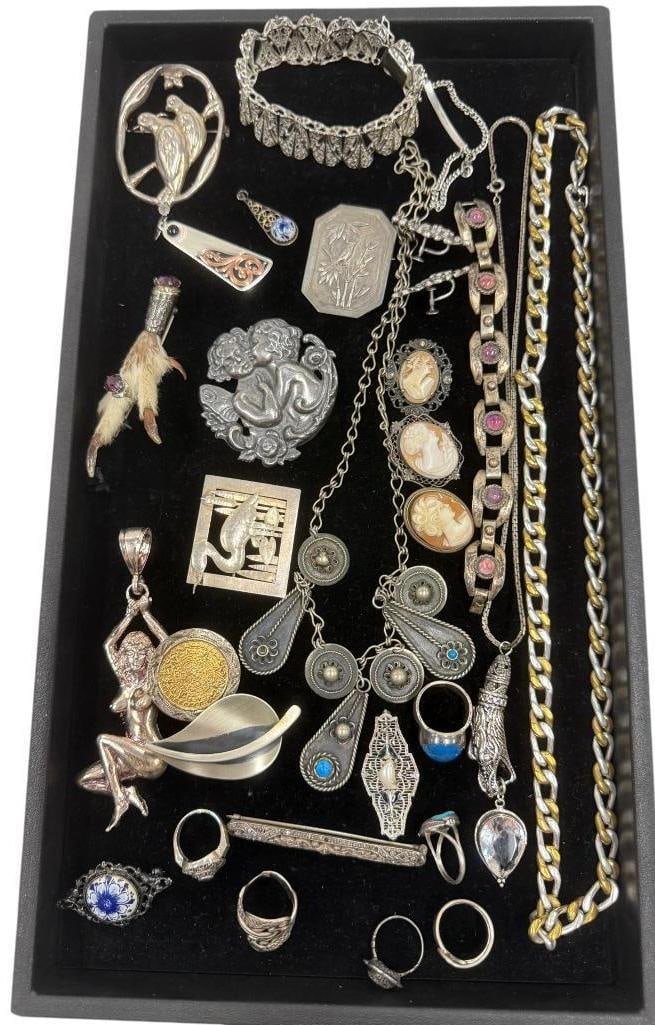 Costume Jewelry rings, necklaces, bracelets and more: Costume Jewelry rings, necklaces, bracelets, pins etc. Some silver.