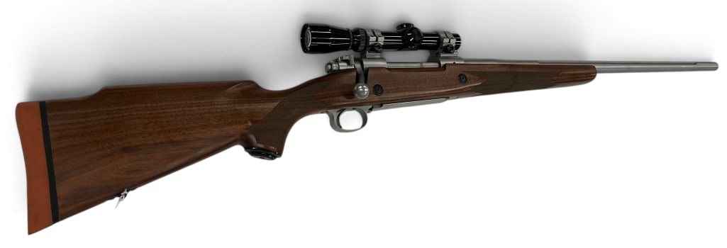 Winchester Model 70 .375 cal: Winchester Model 70 .375 cal, stainless with fluted barrel. Overall length approx. 45 inches. Serial # G159684.