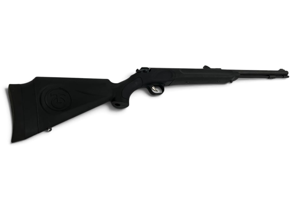 Thompson Center TC Impact .50 caliber rifle: Thompson Center TC Impact .50 caliber muzzleloader. Overall length approx. 40 inches. Serial # VUA 1613..