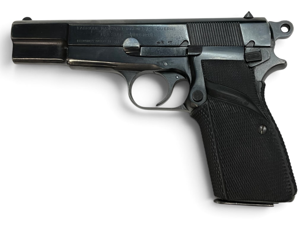 Fabrique Nationale Browning High Power 9mm pistol: Fabrique Nationale Browning High Power 9mm semi auto pistol. Includes 2 magazines. Serial # 54590.