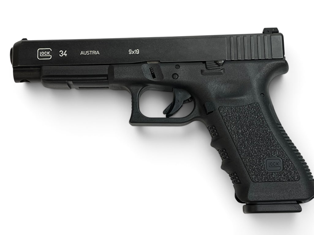 Glock Model 34 9mm pistol: Glock Model 34 9mm semi auto pistol. Serial # NNT184.