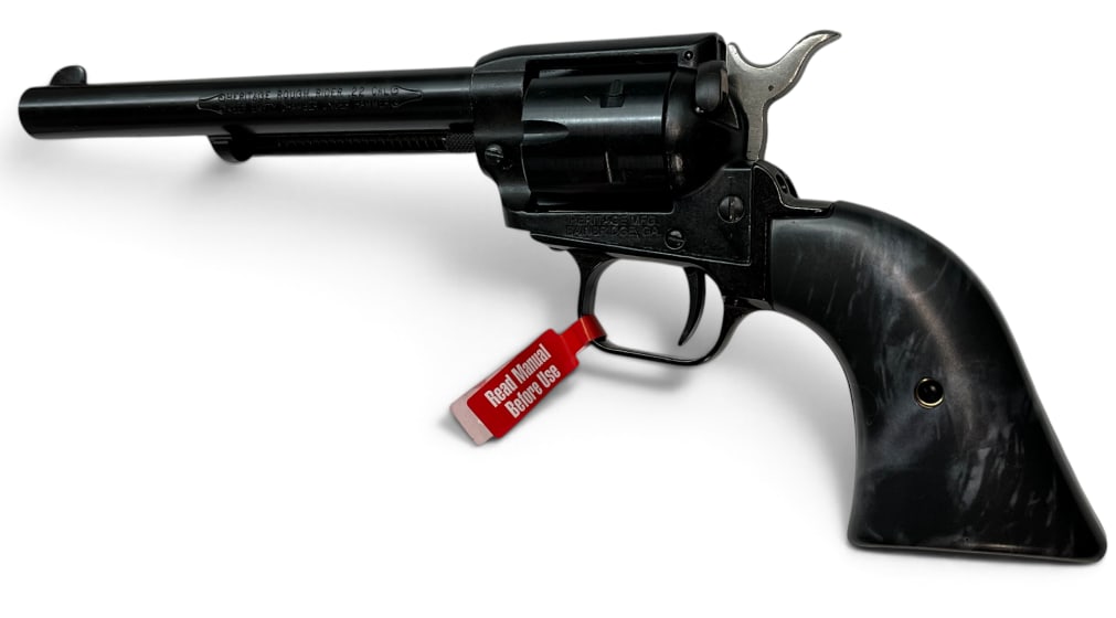 Heritage Rough Rider .22 cal revolver: Heritage MFG. Rough Rider .22 cal revolver. 6 1/2 inch barrel. Serial # 1BH410106.