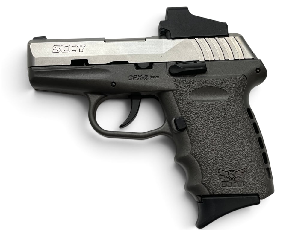 SCCY Model CPX-2 9mm pistol: SCCY Model CPX-2 9mm semi auto pistol with Crimson Trace red dot sight. Serial # C054617.
