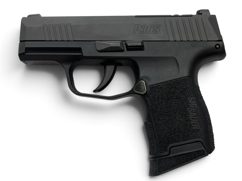 Sig Sauer Model P365 .380 ACP pistol: Sig Sauer Model P365 .380 ACP semi auto pistol.Includes 2 magazines and case. Serial # 66B910980.