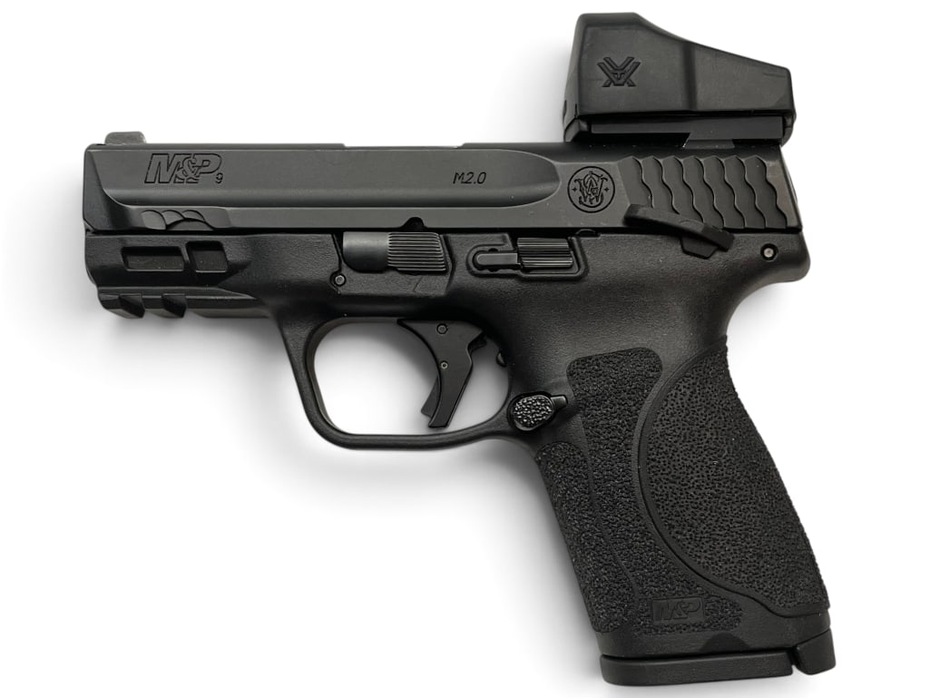 Smith & Wesson M&P 9 M2.0 9mm pistol: Smith & Wesson M&P 9 Compact M2.0 9mm semi auto pistol, with Venom sight. Includes 2 magazines. Serial # NDC0041.