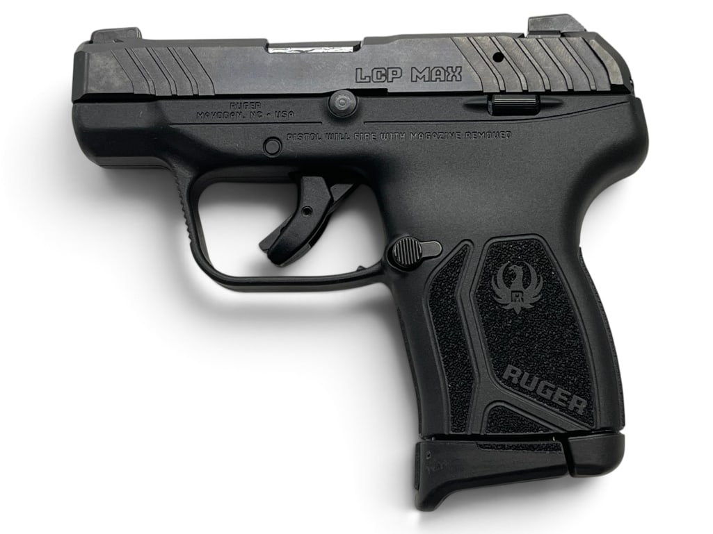 Ruger LCP Max .380 ACP pistol: New Ruger LCP Max .380 ACP semi auto pistol. Includes holster and box. Serial # 380919657.