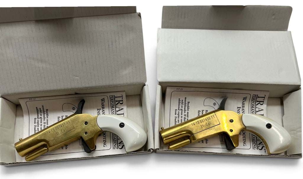 2 Traditions Vest Pocket Derringers: 2 Traditions Vest Pocket Derringers, .31 cal percussion smoothbore pistols. Serial #s 14-13-007430-11 and 14-13-007431-11.