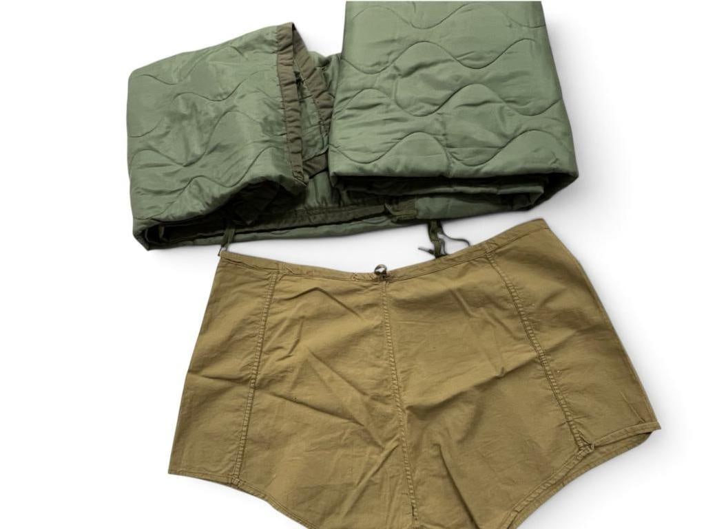 North Vietnamese NVA lighter, briefs and CISO poncho liner: North Vietnamese NVA lighter, briefs and CISO poncho liner. 3 pieces. Includes Special Forces History COA.