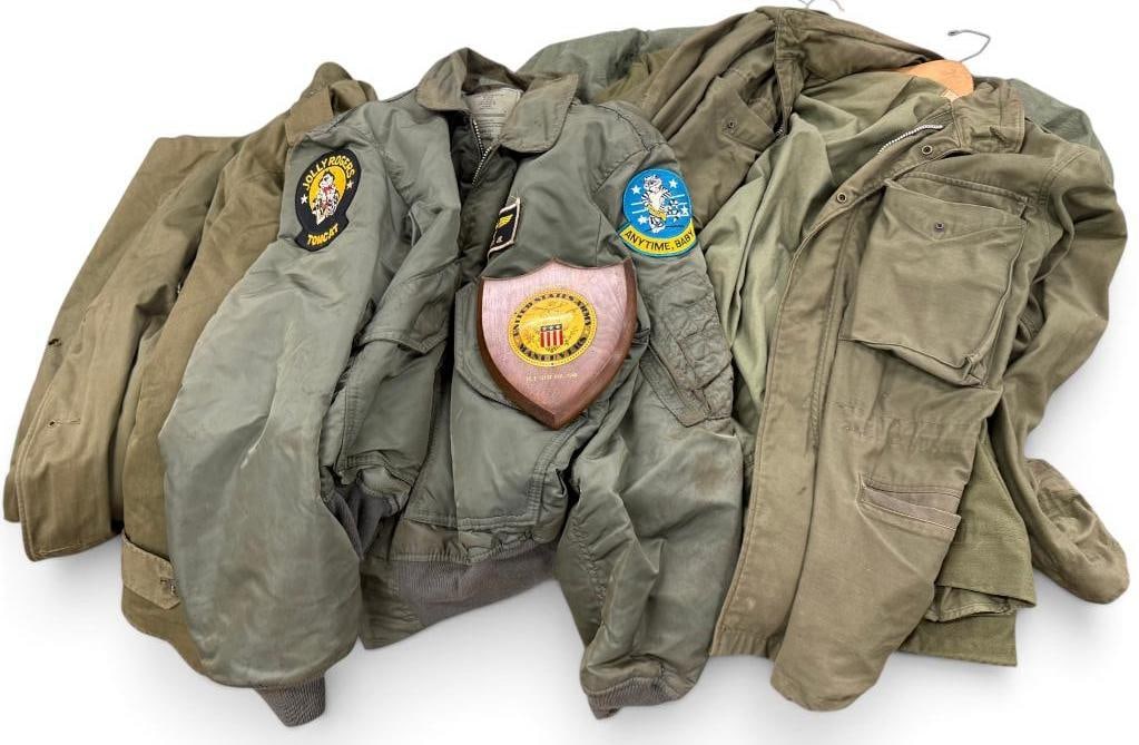 U.S. Military coats, Air Force Jacket and more: U.S. Military coats, Air Force Jacket with Fighting 84 and Jolly Roger Tomcat patch and more. 6 pieces.