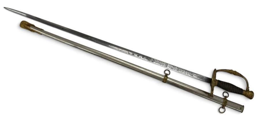 Warnock Uniform Co. G.A.R. sword: Warnock Uniform Co. G.A.R. sword. Sword with scabbard approx. 37 inches.