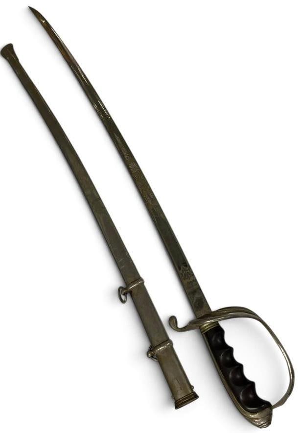 U.S. Model 1902 Officer's Sword: U.S. Model 1902 Officer's Sword. Marked U.S. on the blade with Proved Star of David. Sword in scabbard approx. 39 inches.